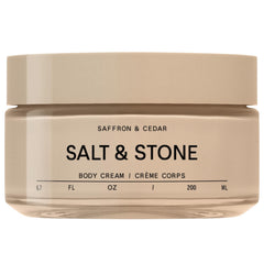 Salt & Stone body cream saffron cedar bottle highlights lasting scent and hydrating formula.