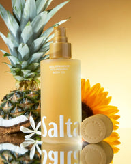 Saltair Body Oil close-up showing silky non-greasy absorption