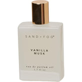 Sand + Fog Vanilla Musk rollerball bottle delivering long-lasting warmth for on-the-go scent.