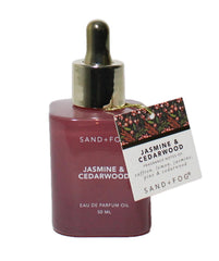 Sand + Fog Jasmine & Cedarwood bottle highlights elegant daily-wear fragrance.
