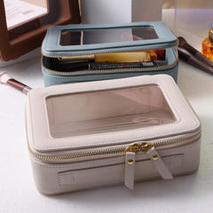 SANHECUN travel pouch with clear front window for easy cosmetics sighting.