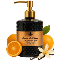 Savon De Royal bottle close-up reveals vanilla-orange fragrance for daily pampering.