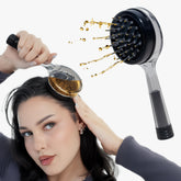 Scalp Direct massager brush demonstrates precise scalp serum delivery.