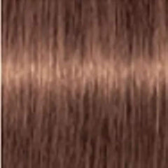 Schwarzkopf Igora Royal color creme 7-57 tube in use showing precise application for even tone and gray coverage.