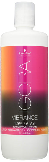 Schwarzkopf Igora Royal Vibrance Activator Lotion bottle pouring for even color development