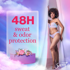 Secret Dry Spray drying action shot emphasizes instant dry finish after application.