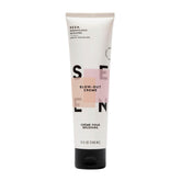 SEEN Blow-Out Creme bottle-application demonstrates easy pump for quick styling and frizz reduction.