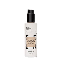 SEEN Leave-In Conditioner bottle close-up highlighting lightweight hydration and frizz control.