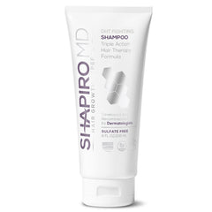 Shapiro MD Hair Growth Experts vegan shampoo bottle closeup showing DHT-blocking formula for fuller-looking hair