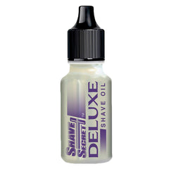 Shave Secret Deluxe oil bottle pouring for smooth glide and hydration.
