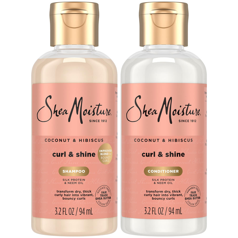 SheaMoisture Curl & Shine shampoo bottle showcases glossy curls on the go.