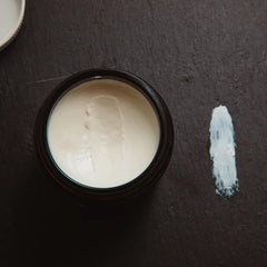 Shear Revival Crystal Lake pomade amber glass packaging emphasizes travel-friendly eco-conscious design