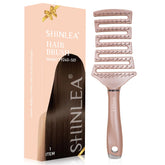 SHINLEA curved detangling brush front view with ergonomic grip for painless detangling.