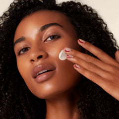 Rich texture of Shiseido Benefiance cream on skin.
