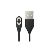 SHOKZ magnetic charger closeup shows quick-magnet alignment for OpenRun Pro charging