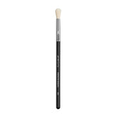 Sigma Beauty E35 tapered blending brush creates crease-application for precise color placement and blending.