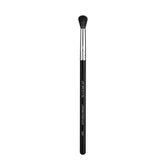 Sigma Beauty E38 diffused crease brush for seamless crease blending and soft edges.