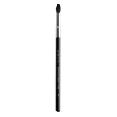Sigma Beauty E45 small eyeshadow brush with pointed tip enables precise color blending for crease work.
