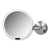 simplehuman 8-inch brushed round wall-mount mirror, full-face view for precise makeup application