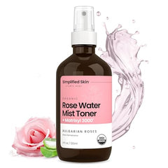 Simplified Skin rose water spray bottle on bathroom shelf for hydration boost