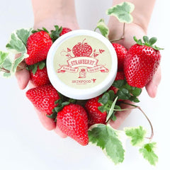 Skinfood 1957 strawberry mask application on face for smooth, refreshed skin