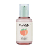 SKINFOOD Peach Sake Serum bottle close-up highlighting branding and pore care appeal.