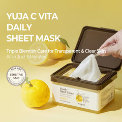 SKINFOOD Yuja C Vita Daily Mask on face demonstrates quick 5-minute brightening and hydration.