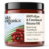 Sky Organics Batana Oil bottle pour enabling easy scalp nourishment massage