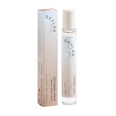 Skylar Coconut Cove bottle top view shows the airy, citrus-coconut vibe for daily wear
