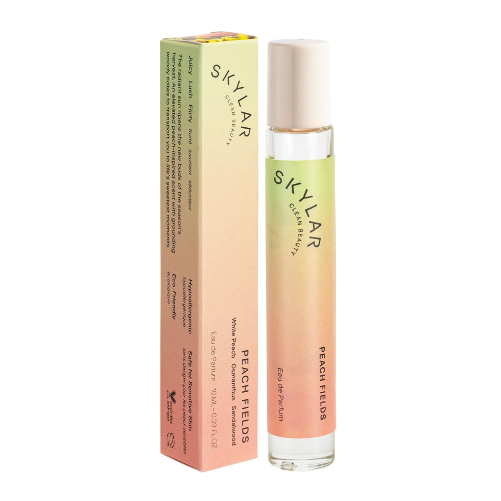 Skylar Peach Fields bottle closeup highlighting hypoallergenic, clean fragrance for sensitive skin.