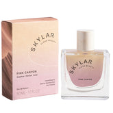 Skylar Pink Canyon bottle front highlights a light woody citrus scent for daily wear.