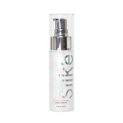 Sleek'e Silk'e Hair Repair Therapy Serum bottle closeup shows frizz-control for smoother styling.