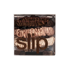 SLIP Skinny Scrunchies light-brown pack pairs with light hair for creaseless wear.