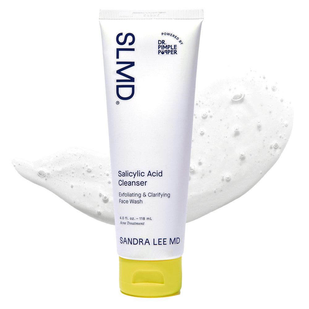 SLMD Salicylic Acid Cleanser bottle on sink; promotes clearer pores and refreshed skin.