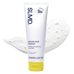 SLMD Salicylic Acid Cleanser bottle on sink; promotes clearer pores and refreshed skin.