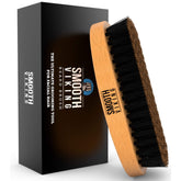 Smooth Viking beard brush natural boar bristle close-up showing even oil distribution for a polished look.