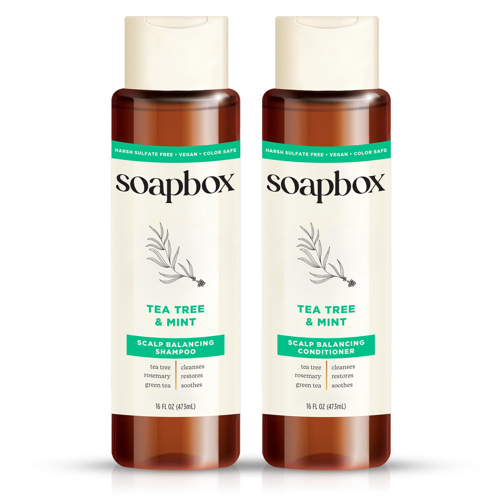 Soapbox Tea Tree Shampoo bottle pour refreshing scalp care.