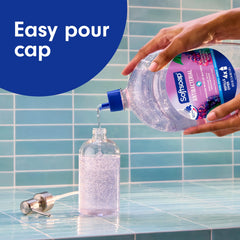 Close-up foam texture from Softsoap showing gentle lather and moisturizing feel benefit