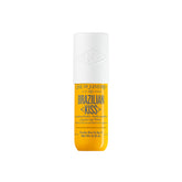 Sol de Janeiro Brazilian Kiss lip butter tube closeup showing smooth, nourished lips