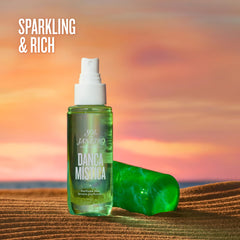 Sol de Janeiro Danca Mistica spray application showing travel-friendly design for on-the-go fragrance.