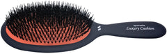 Spornette boar and nylon bristles detail promoting detangling