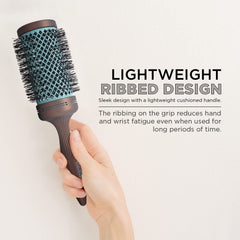 SPORNETTE Ion Fusion vented ceramic barrel speeds drying and styling.