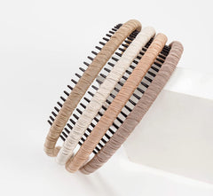 STHUAHE hair hoop with satin finish shows flexible headband design.