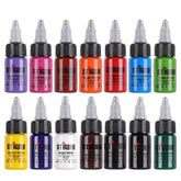STIGMA tattoo ink set 14 colors with pours shows vibrant pigments for bold line work