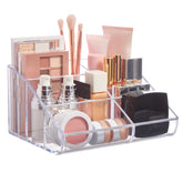 STORi clear plastic vanity organizer with six compartments keeps cosmetics neatly grouped.