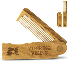 Striking Viking folding sandalwood comb open for on-the-go beard styling.