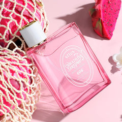 Sttes Perfume 608 display uses vibrant pink hues to signal tropical-inspired scent.