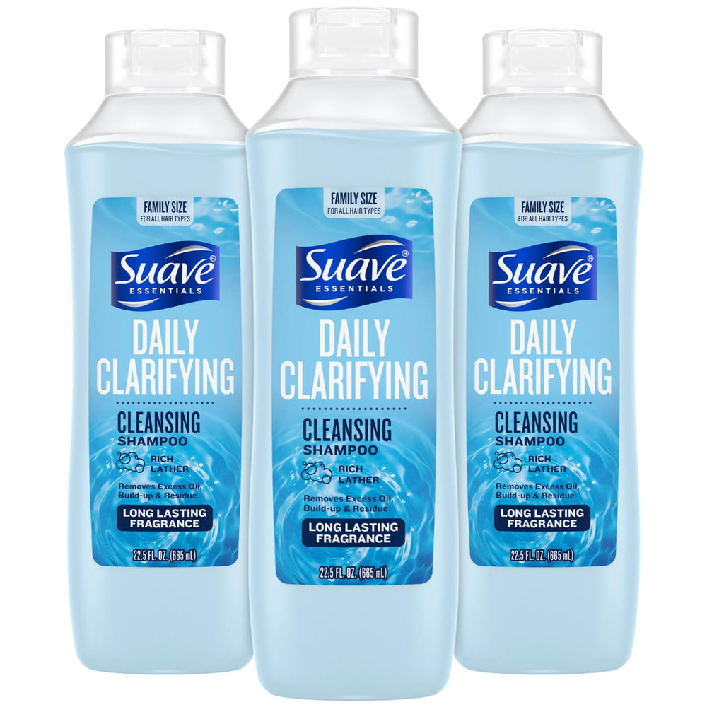 Suave Clarifying Shampoo bottle pours for a refreshing daily cleanse