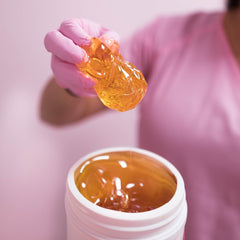 Brazilian area being treated with Sugaring NYC paste.