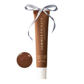 Summer Fridays tinted lip butter Hot Cocoa tube shows warm tint for instant moisture.